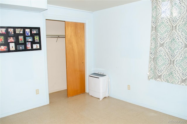 2308 Lelaray St, Colorado Springs, CO 80909 - unfurnished bedroom featuring light flooring, a closet, and baseboards