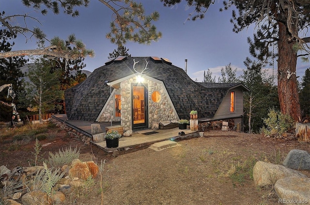 view of front of house featuring a deck