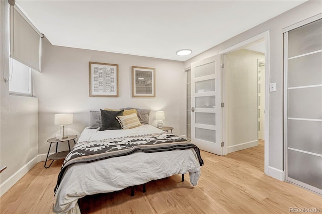 bedroom featuring light hardwood / wood-style flooring