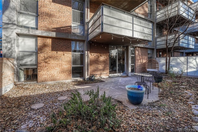 back of house featuring a patio area