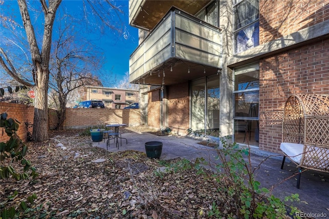 back of house featuring a patio area