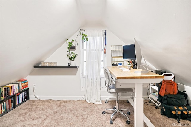 office with vaulted ceiling and carpet flooring