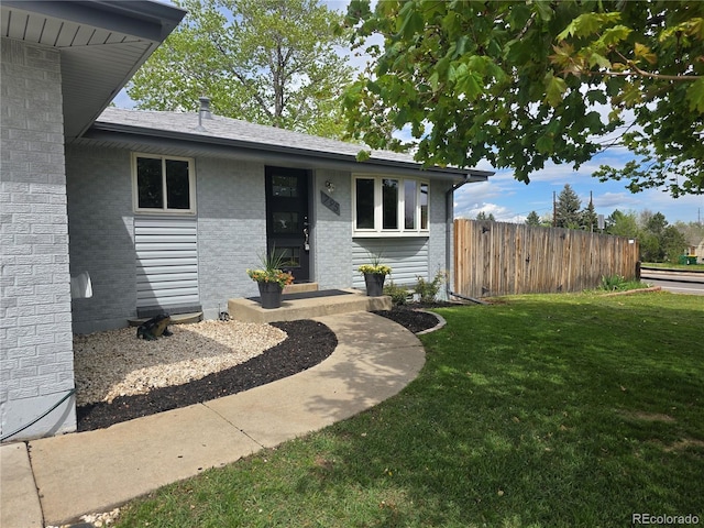 795 Vivian Ct, Lakewood, CO 80401 - view of exterior entry featuring brick siding