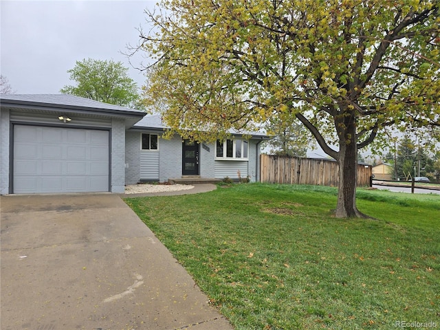 795 Vivian Ct, Lakewood, CO 80401 - ranch-style house with an attached garage, concrete driveway, and brick siding