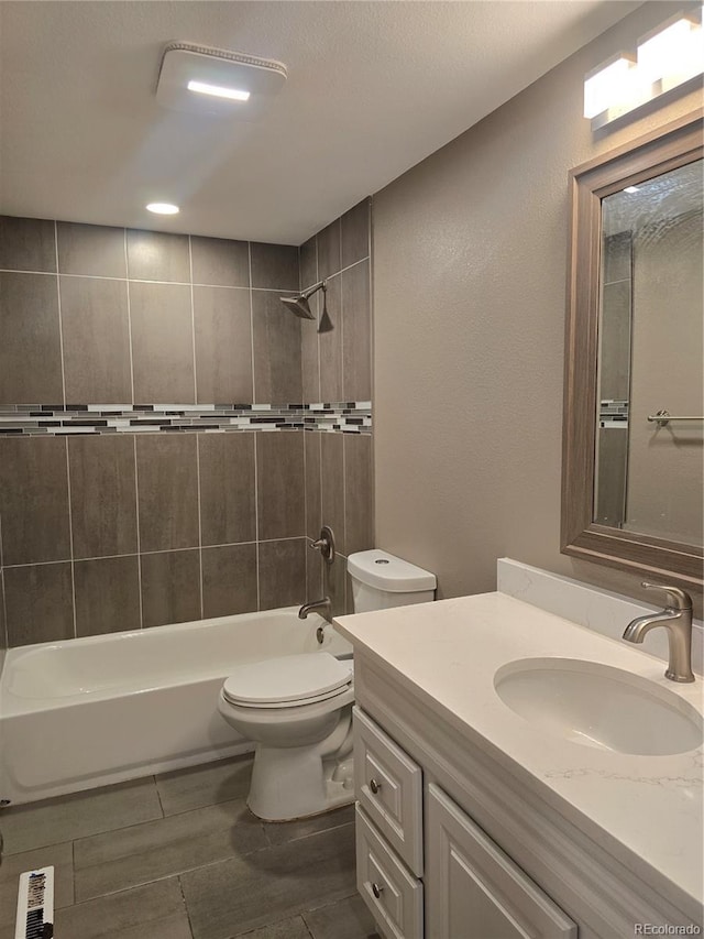 795 Vivian Ct, Lakewood, CO 80401 - bathroom featuring toilet, shower / bathtub combination, and vanity