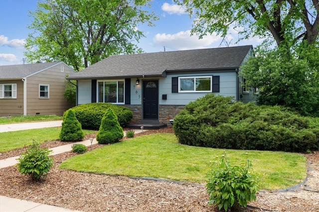 765 Iola St, Aurora, CO 80010 - view of front of house with a front lawn and a shingled roof