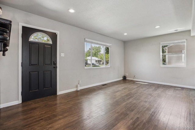 765 Iola St, Aurora, CO 80010 - entryway with wood finished floors, baseboards, and recessed lighting