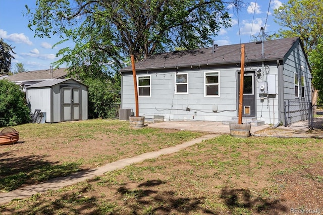 765 Iola St, Aurora, CO 80010 - rear view of house with a patio and central AC unit
