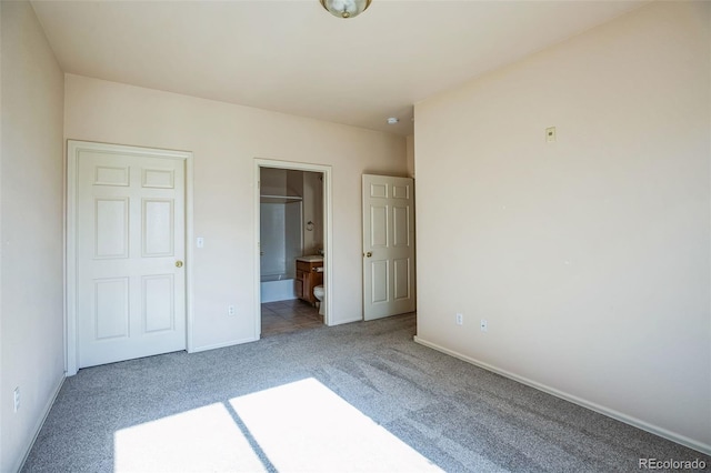 2491 Fountain Greens Blvd Unit B1, Grand Junction, CO 81505 - unfurnished bedroom with carpet floors and ensuite bathroom