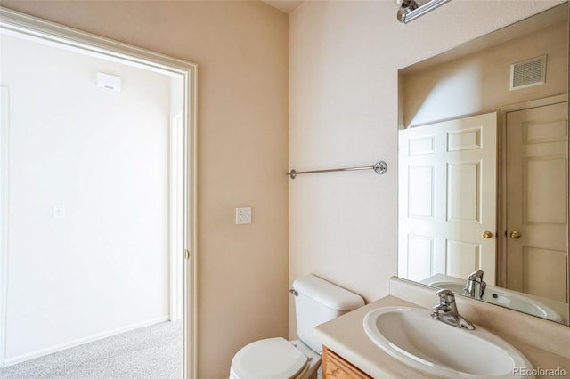 2491 Fountain Greens Blvd Unit B1, Grand Junction, CO 81505 - half bath featuring vanity and toilet