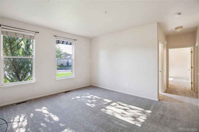 2491 Fountain Greens Blvd Unit B1, Grand Junction, CO 81505 - empty room with carpet floors and a smoke detector