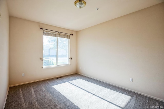 2491 Fountain Greens Blvd Unit B1, Grand Junction, CO 81505 - carpeted empty room featuring baseboards