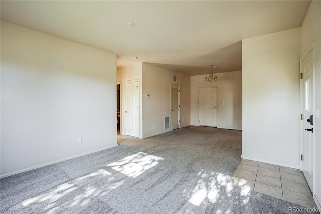2491 Fountain Greens Blvd Unit B1, Grand Junction, CO 81505 - empty room featuring carpet floors and a pendent fire sprinkler
