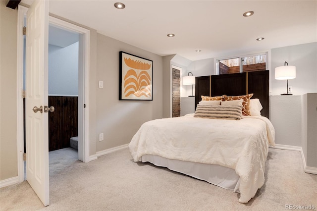 bedroom featuring light carpet