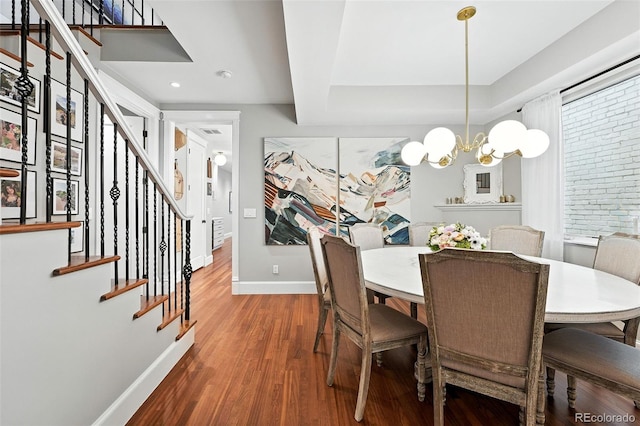 549 Milwaukee St, Denver, CO 80206 - dining room featuring wood finished floors, stairs, a chandelier, and recessed lighting