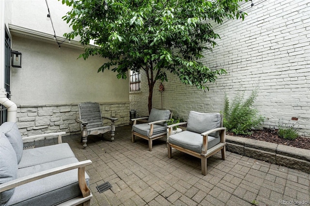 549 Milwaukee St, Denver, CO 80206 - view of patio / terrace featuring an outdoor living space