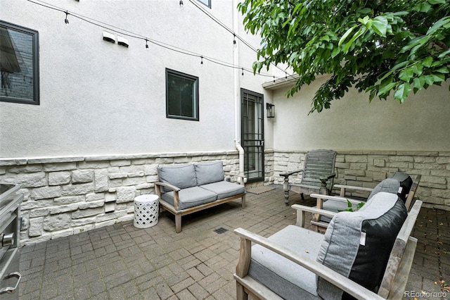 549 Milwaukee St, Denver, CO 80206 - view of patio featuring an outdoor living space