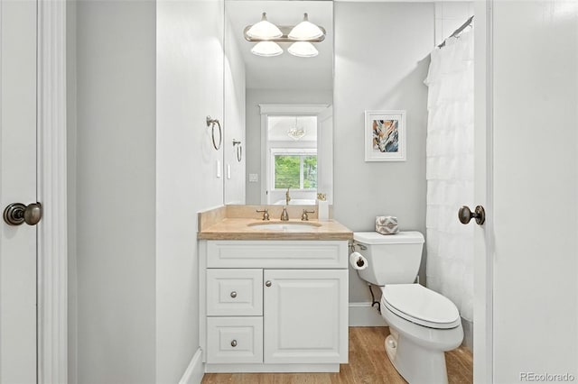 549 Milwaukee St, Denver, CO 80206 - bathroom with vanity and wood finished floors