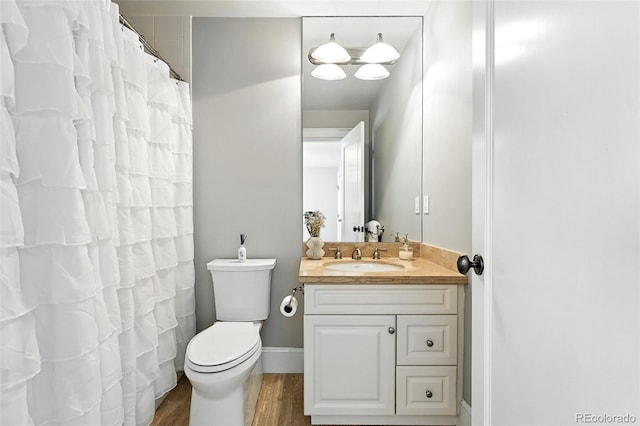 549 Milwaukee St, Denver, CO 80206 - full bath featuring vanity and wood finished floors