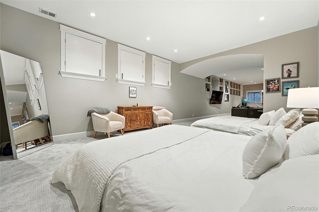 549 Milwaukee St, Denver, CO 80206 - carpeted bedroom featuring arched walkways and recessed lighting