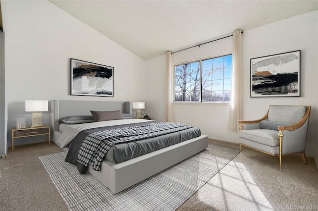 bedroom featuring carpet and lofted ceiling