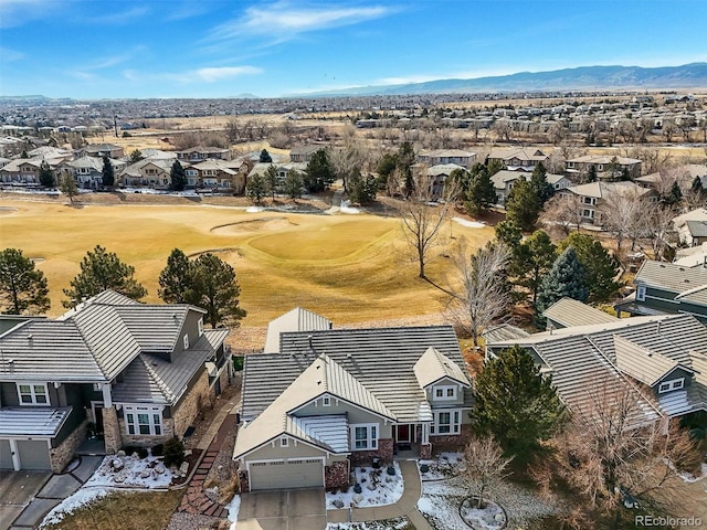 bird's eye view with golf course view, a residential view, and a mountain view