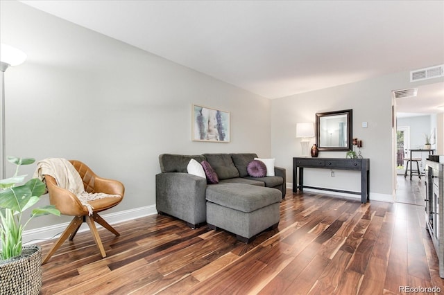 living room with hardwood / wood-style flooring