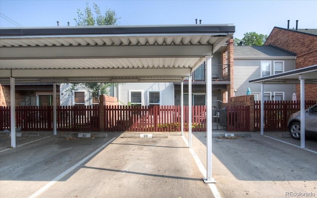 view of parking / parking lot with a carport