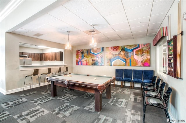 recreation room with a drop ceiling, dark carpet, and billiards