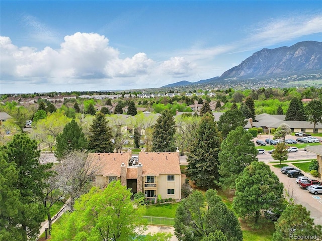 aerial view of residential area with a mountainous background