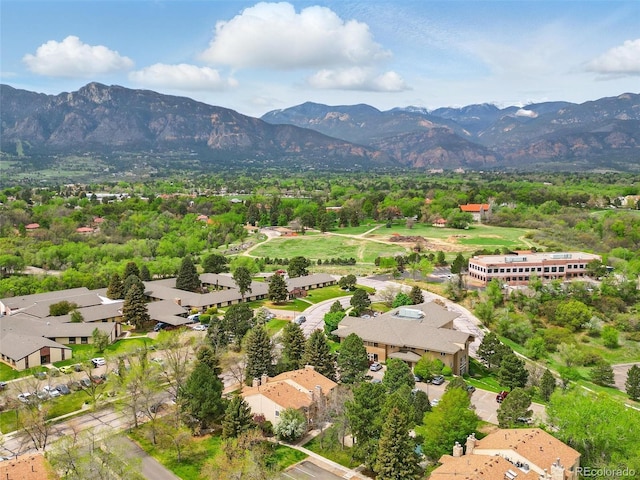 aerial view of residential area featuring a mountain backdrop