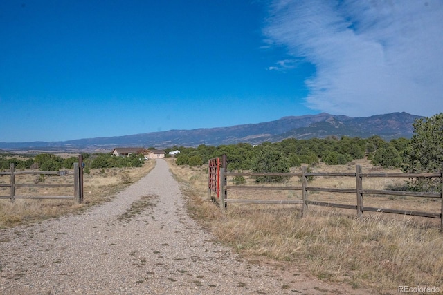 mountain view featuring a rural view