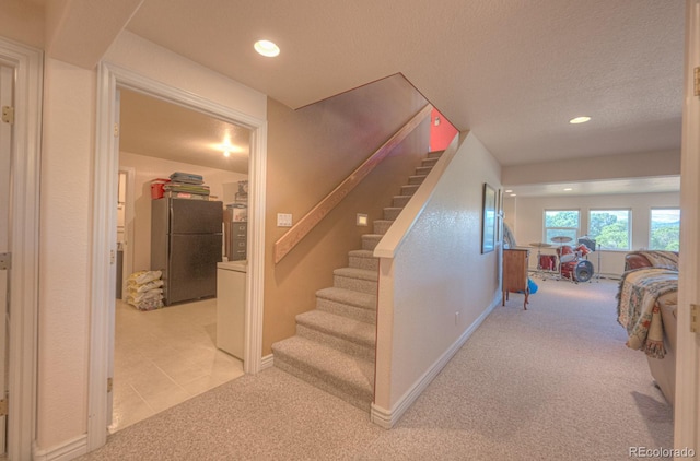 stairway with carpet flooring