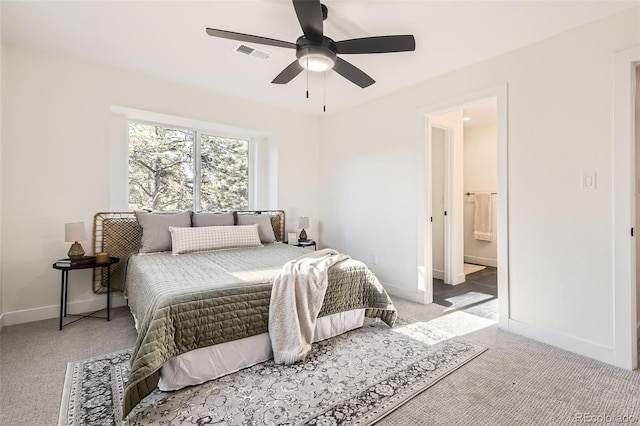 2037 Mockingbird Trl, Bailey, CO 80421 - bedroom with carpet flooring, baseboards, a ceiling fan, and ensuite bathroom
