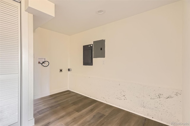 2037 Mockingbird Trl, Bailey, CO 80421 - empty room featuring electric panel, dark wood-type flooring, and baseboards