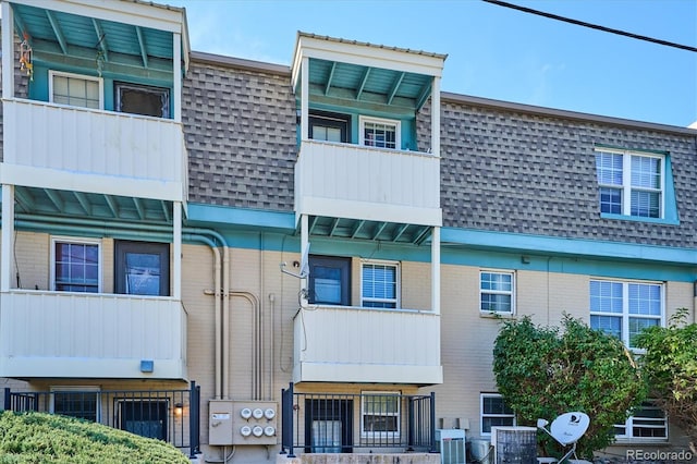 view of building exterior featuring central AC