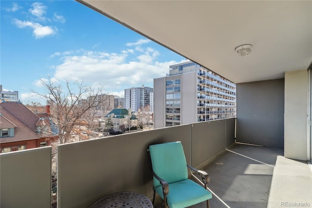 balcony featuring a view of city