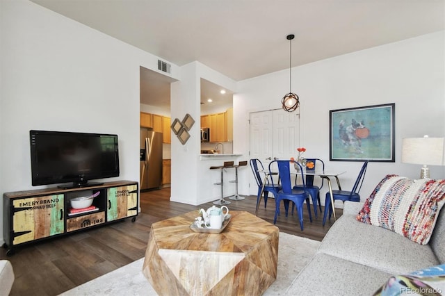 2708 Syracuse St Unit 109, Denver, CO 80238 - living area featuring wood finished floors