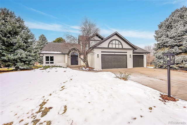 ranch-style home with a garage