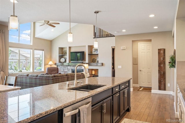 350 Andromeda Ln, Castle Rock, CO 80108 - kitchen featuring stainless steel dishwasher, a ceiling fan, light wood finished floors, decorative light fixtures, and recessed lighting