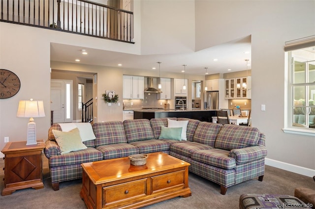 350 Andromeda Ln, Castle Rock, CO 80108 - living area with healthy amount of natural light, recessed lighting, carpet, and a high ceiling