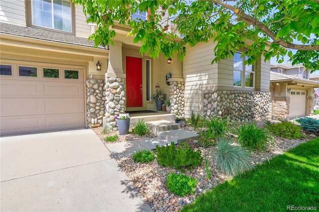 property entrance with a garage