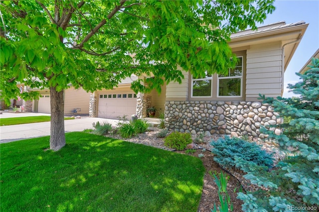 obstructed view of property featuring a garage