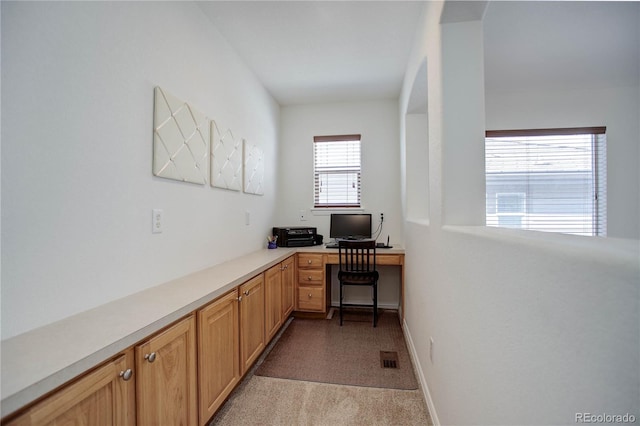 view of carpeted office space