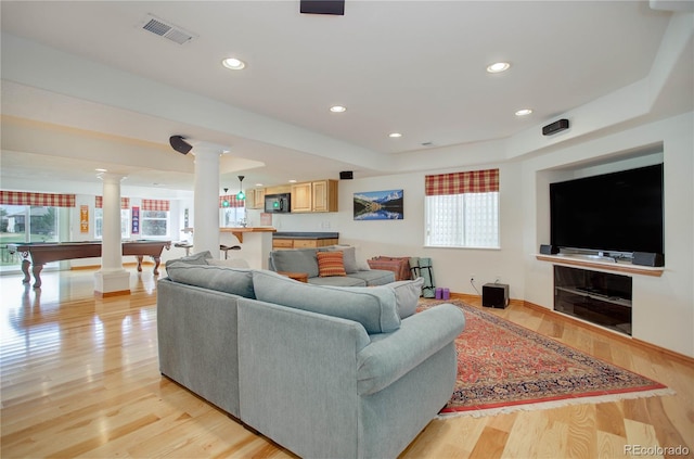 living room with pool table and light wood-type flooring