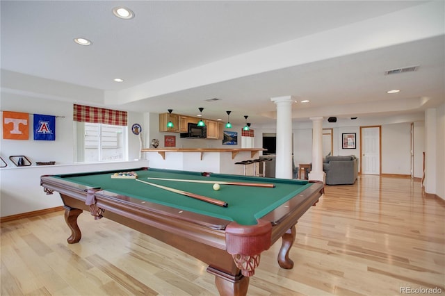 game room featuring decorative columns, light hardwood / wood-style flooring, and pool table