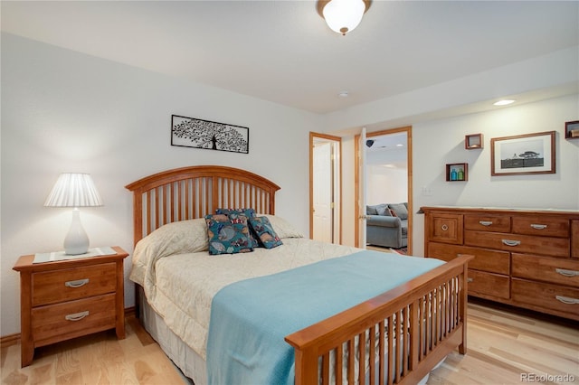 bedroom with light hardwood / wood-style flooring