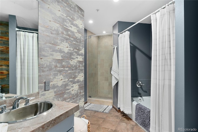 full bathroom featuring vanity, toilet, tile walls, and shower / bathtub combination with curtain