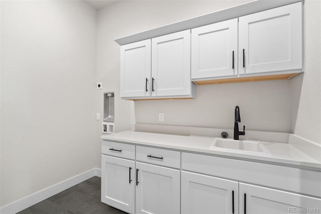 kitchen with sink and white cabinets