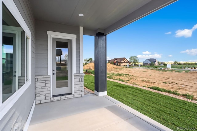 1369 Burt Ave, Berthoud, CO 80513 - view of patio / terrace featuring a residential view